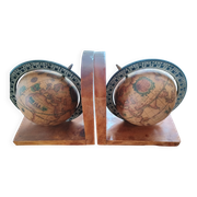 Pair of vintage bookends with rotating terrestrial globes on wooden bases in Spain