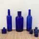 Large blue pharmaceutical vial