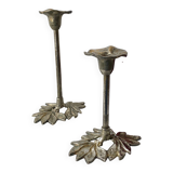 Pair of metal flower candlesticks