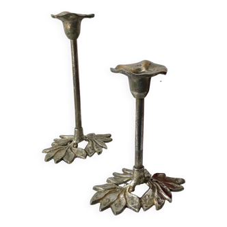 Pair of metal flower candlesticks