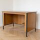 Vintage style desk by Jean Prouvé in oak and black metal.
