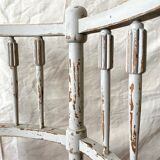 19th-century corner fireplace armchair, wood and cane.