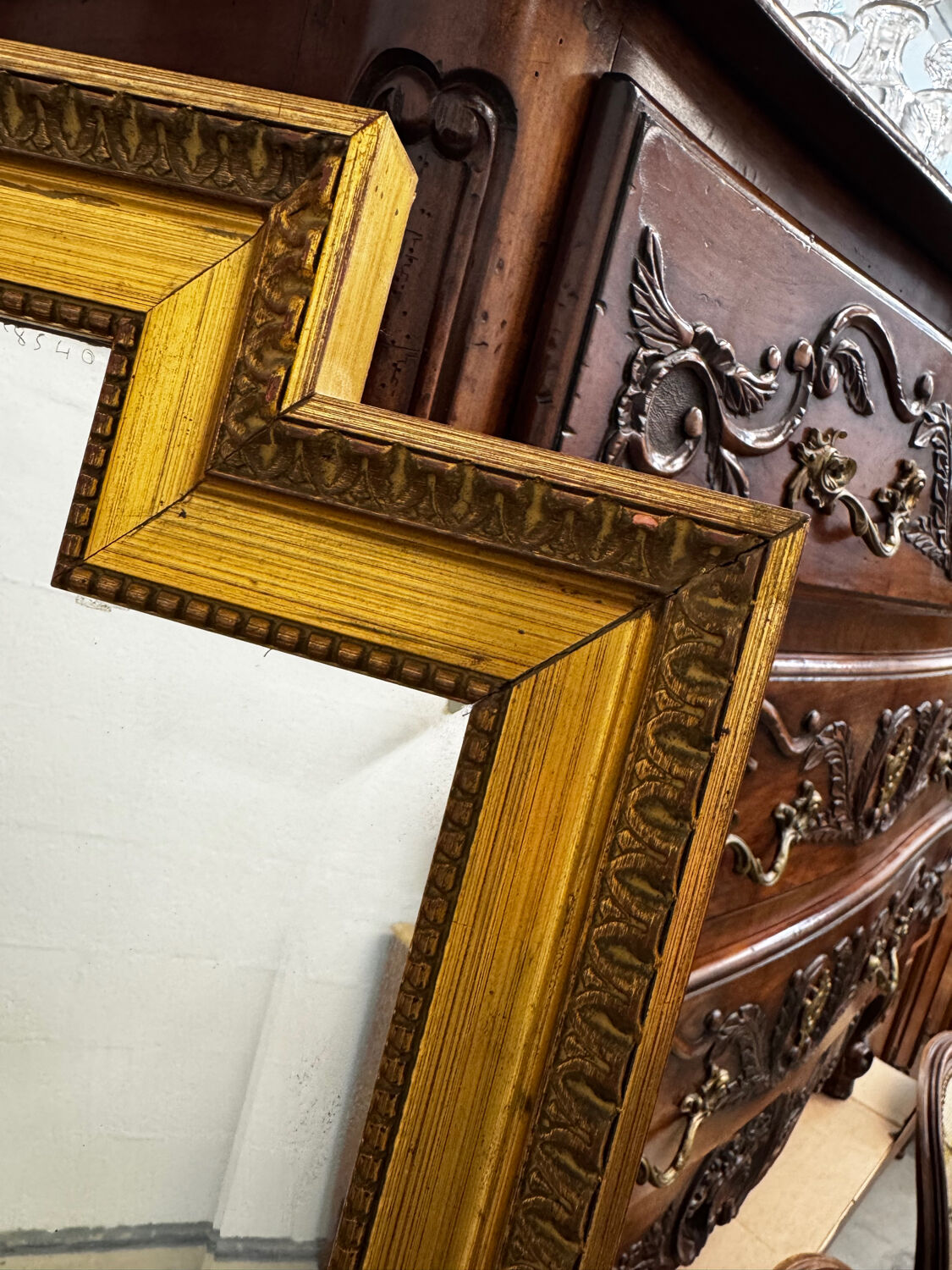 Large gold mirror in the Louis XVI style