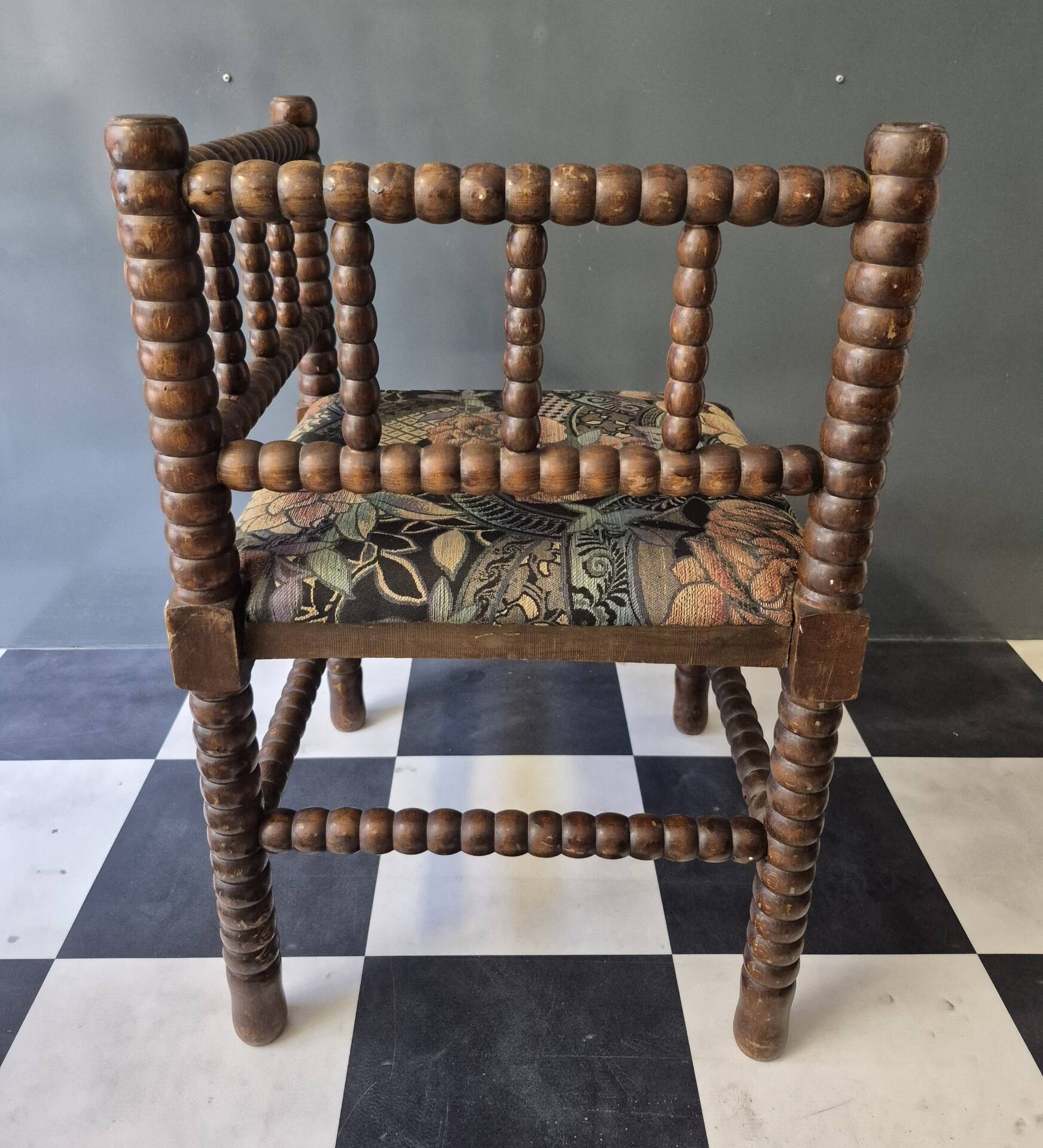 Old pair of corner chairs known as 'fireplace corner' armchairs.