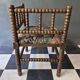 Old pair of corner chairs known as 'fireplace corner' armchairs.
