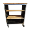 Furniture on metal wheels with modular wooden shelves