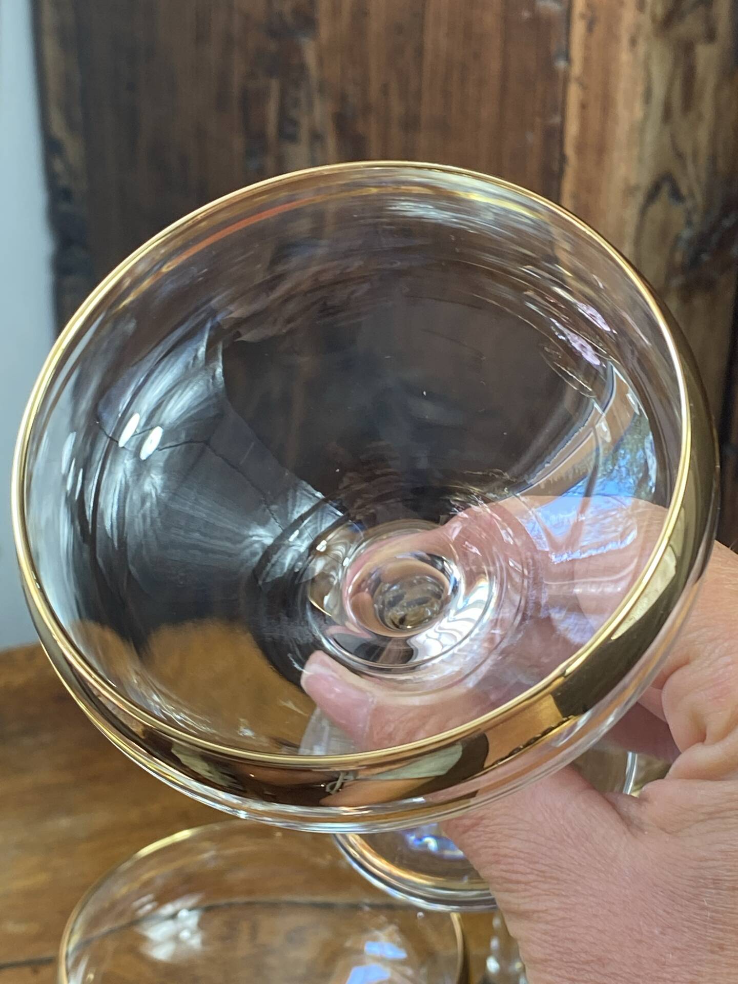 Champagne coupes or cocktail glasses with gilding