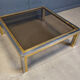 Table basse vintage en chrome et laiton dans le style de Romeo Rega, années 1970.