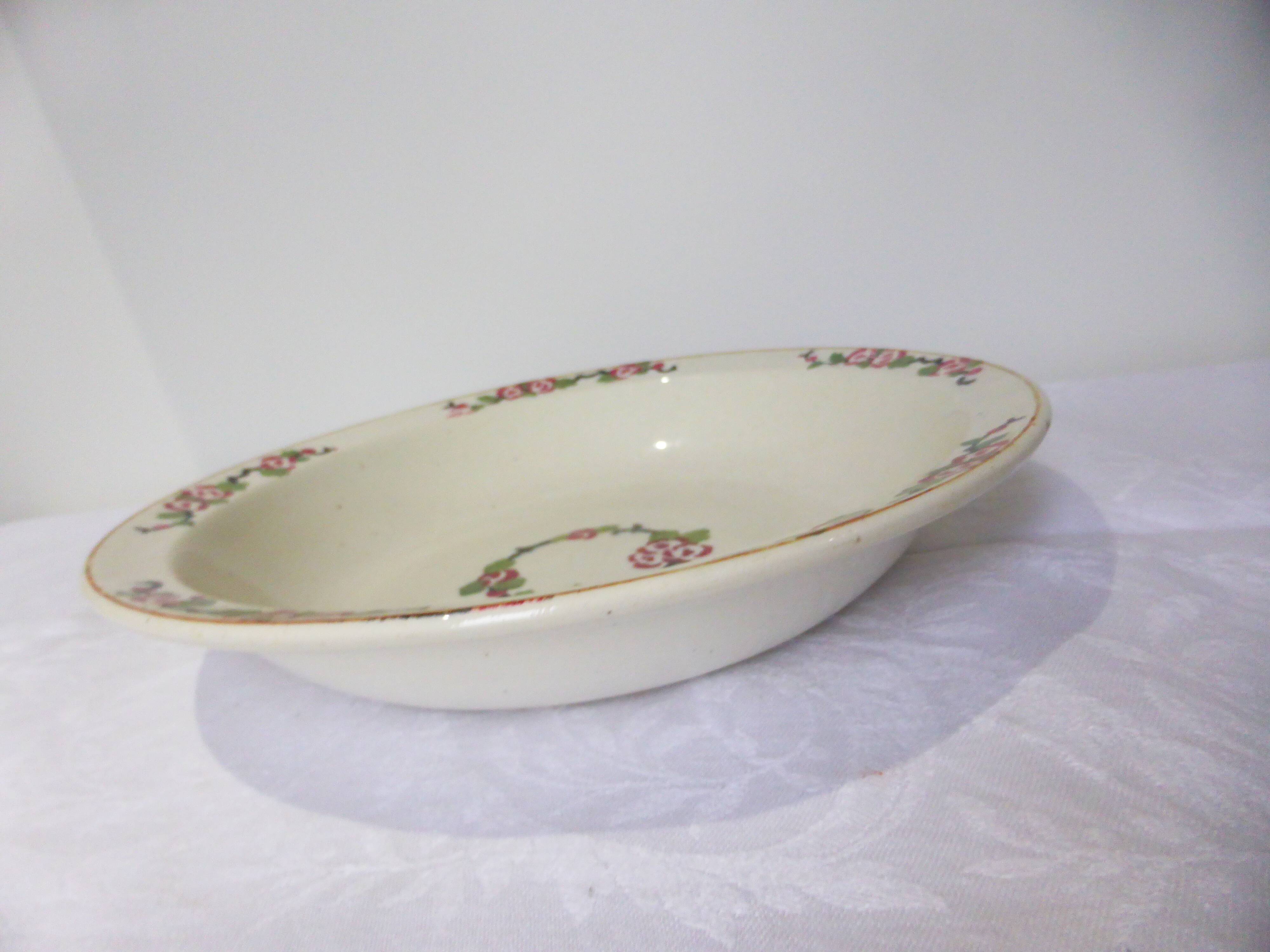 Hollow round dish from Longwy, Aubépine model