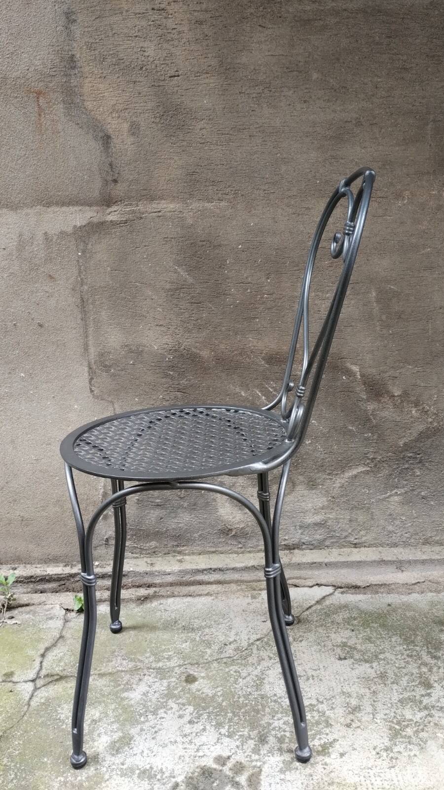 Dark gray wrought iron chair