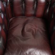 English cowhide Chesterfield club armchair in a beautiful red colour