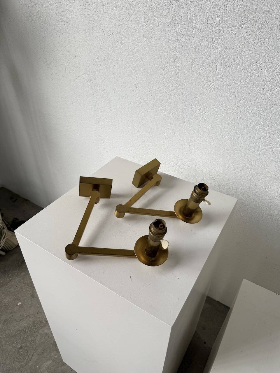 Pair of brass wall lights with articulated arms from the 70s