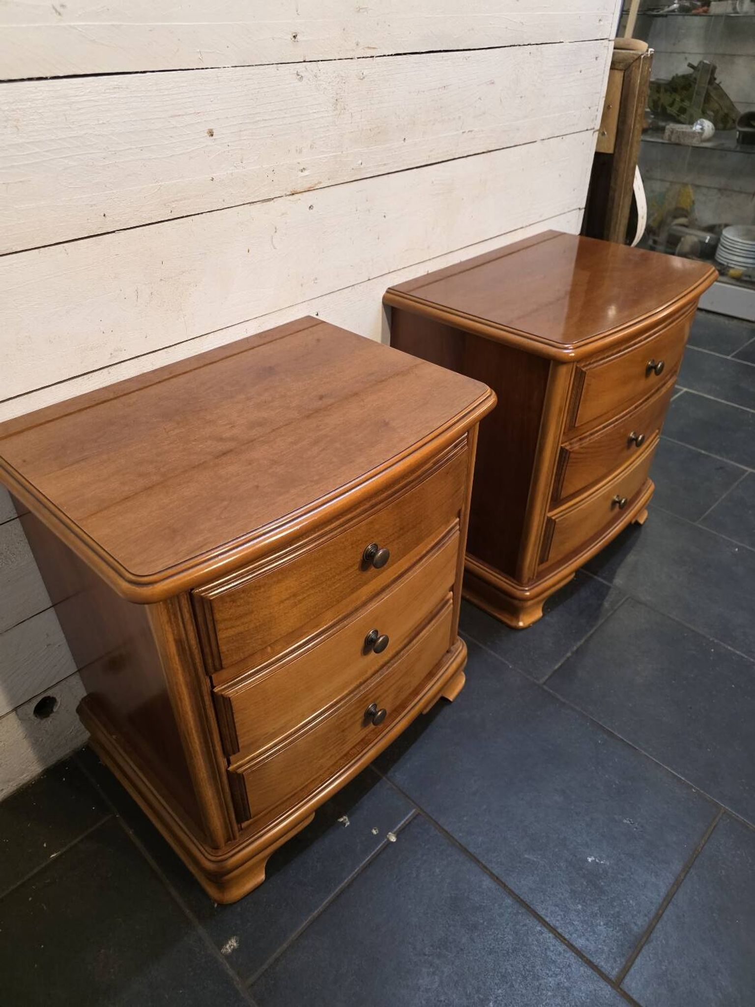 Pair of Louis Philippe style bedside tables in cherry wood.