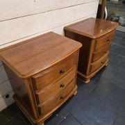 Pair of Louis Philippe style bedside tables in cherry wood.