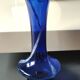 Long flared neck ball vase. Smoked scrolls in cobalt blue art glass, 30cm