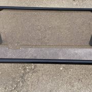 Vintage black tubular coffee table with smoked glass by Yves Boutboul, 1980.