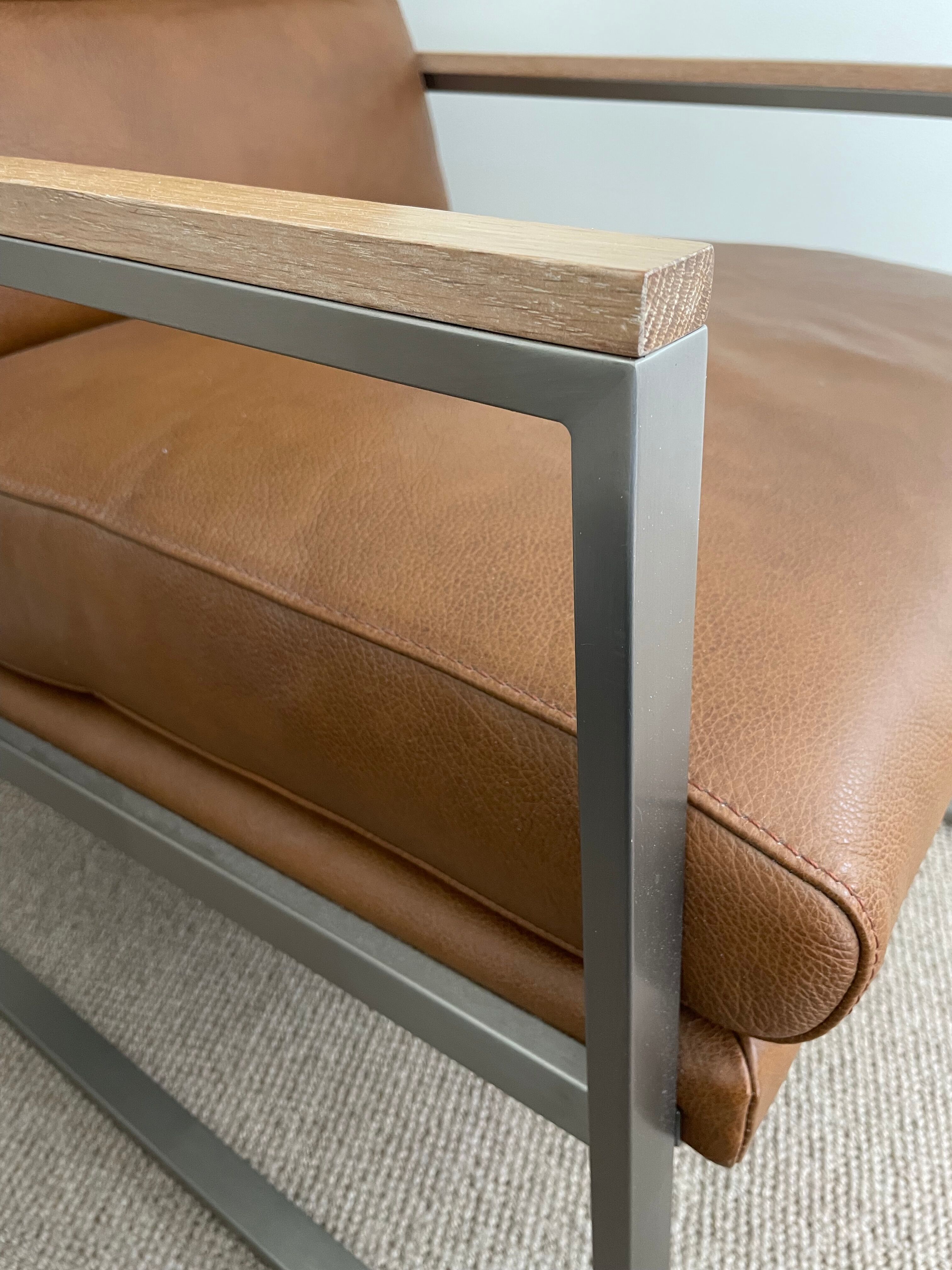 A pair genuine leather armchairs.