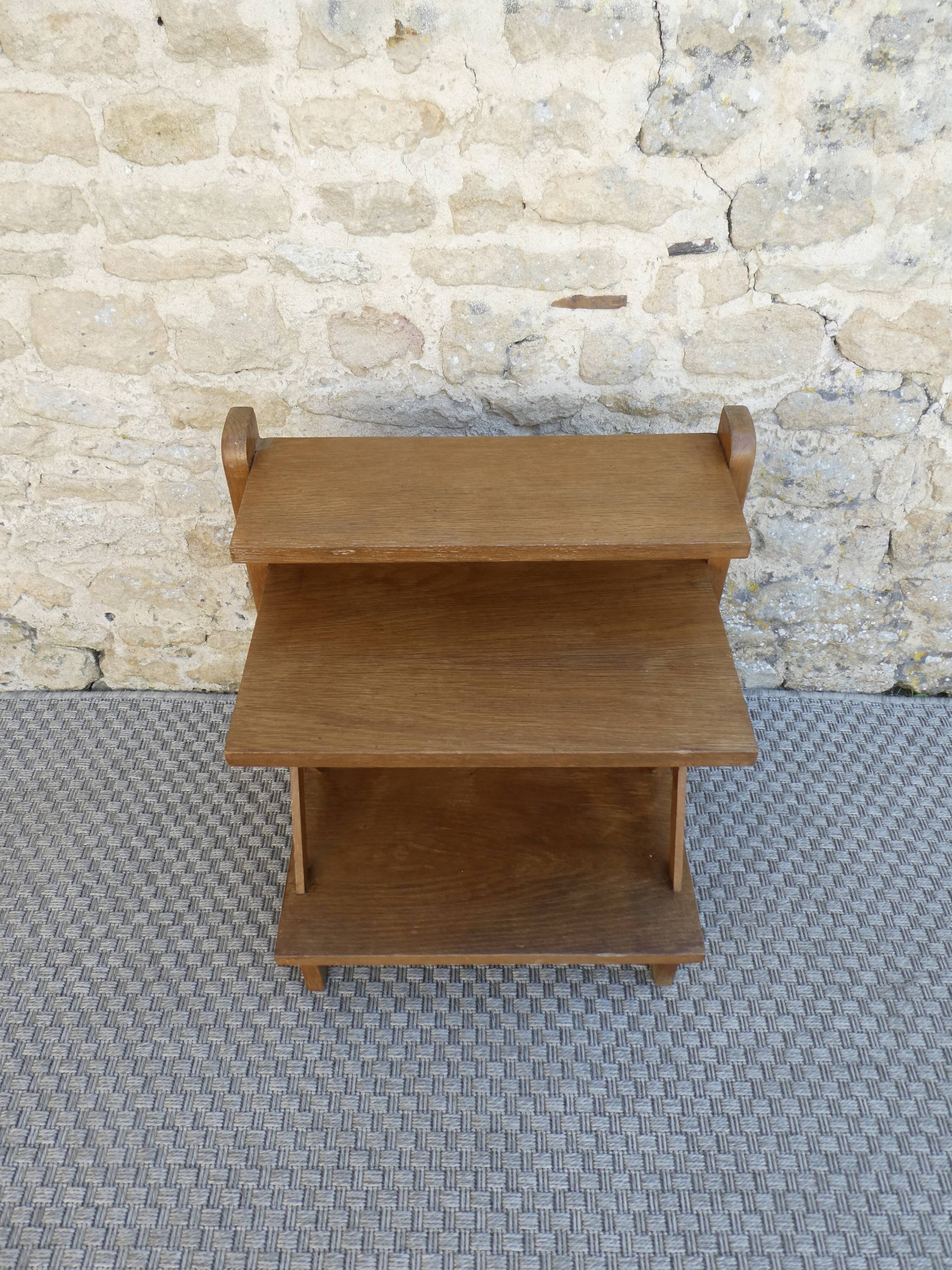 Light wood bedside table with crossbars and 3 shelves, around 1950.
