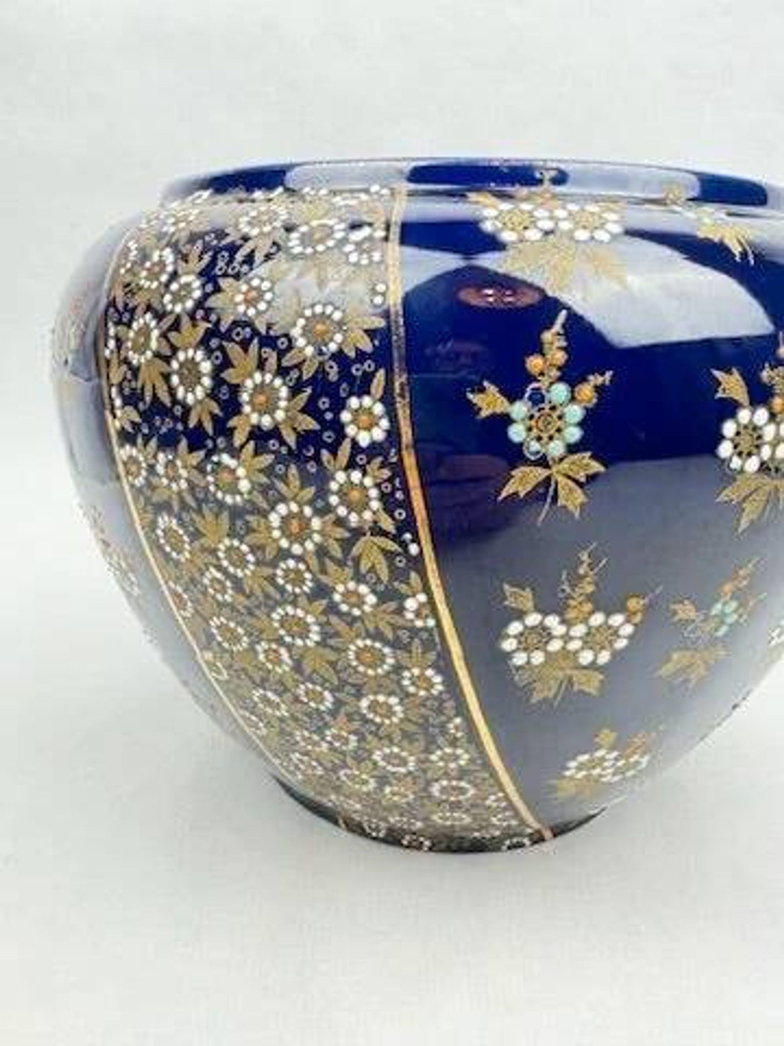 Limoges porcelain flowerpot with gold enamel decoration and blue relief flowers from Four