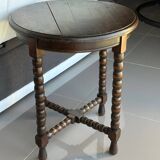 Antique turned wooden side table with authentic charm.