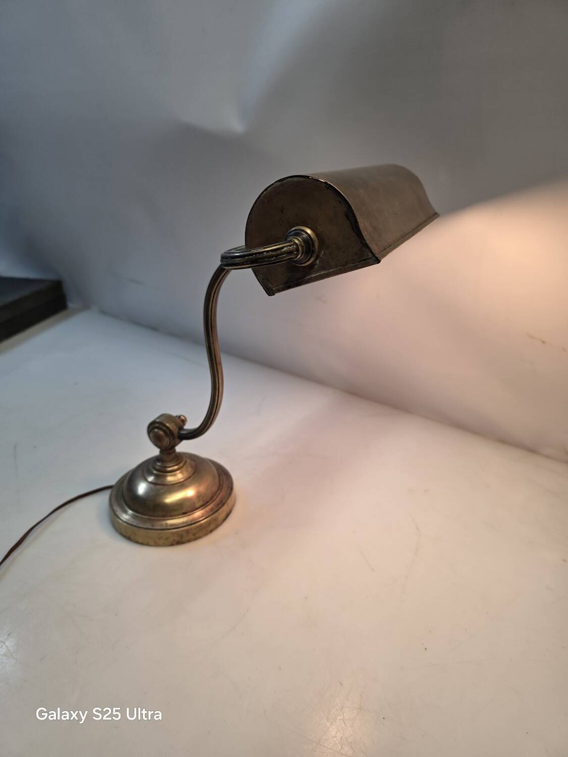 Antique brass desk lamp from a notary.