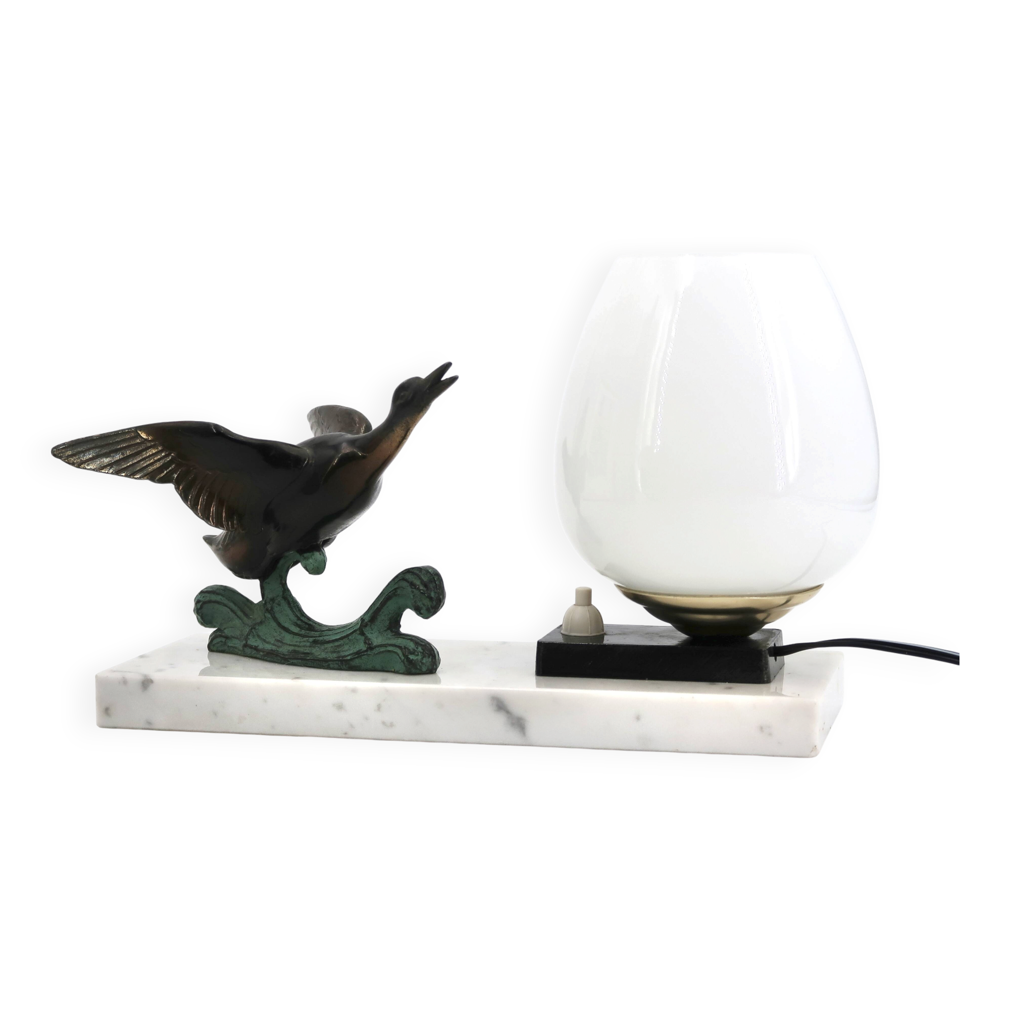 Art Deco lamp decorated with a flying duck, marble base, 1930s.