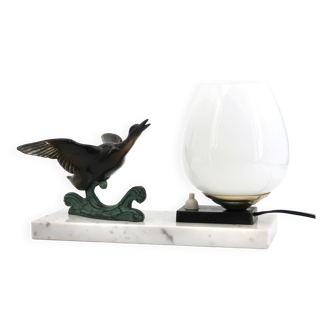 Lampe Art Deco décorée d'un canard en vol, socle marbre, années 30