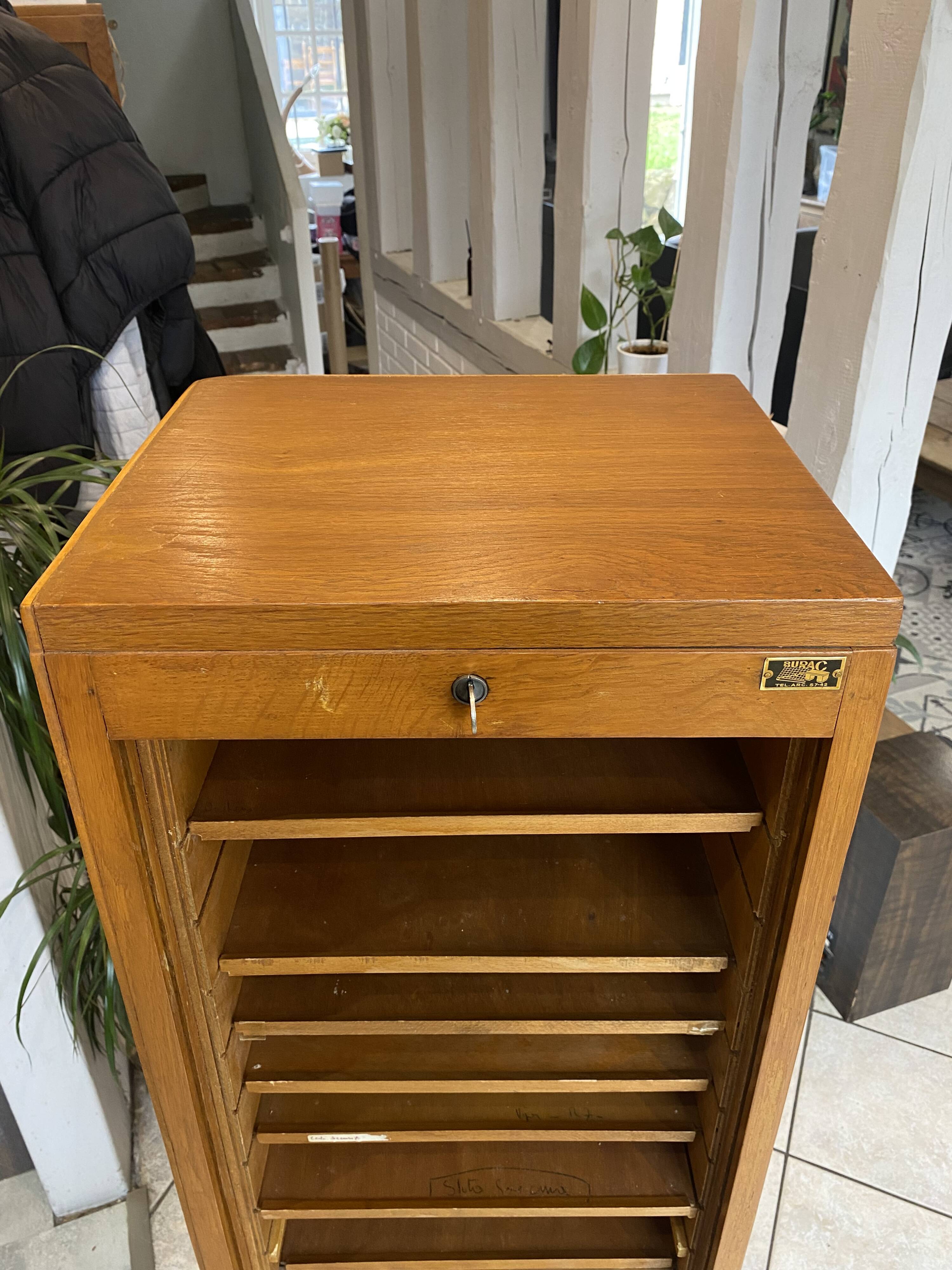 1950s oak office storage cabinet with curtains.