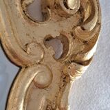 Wooden and gilded mirror with gold leaf