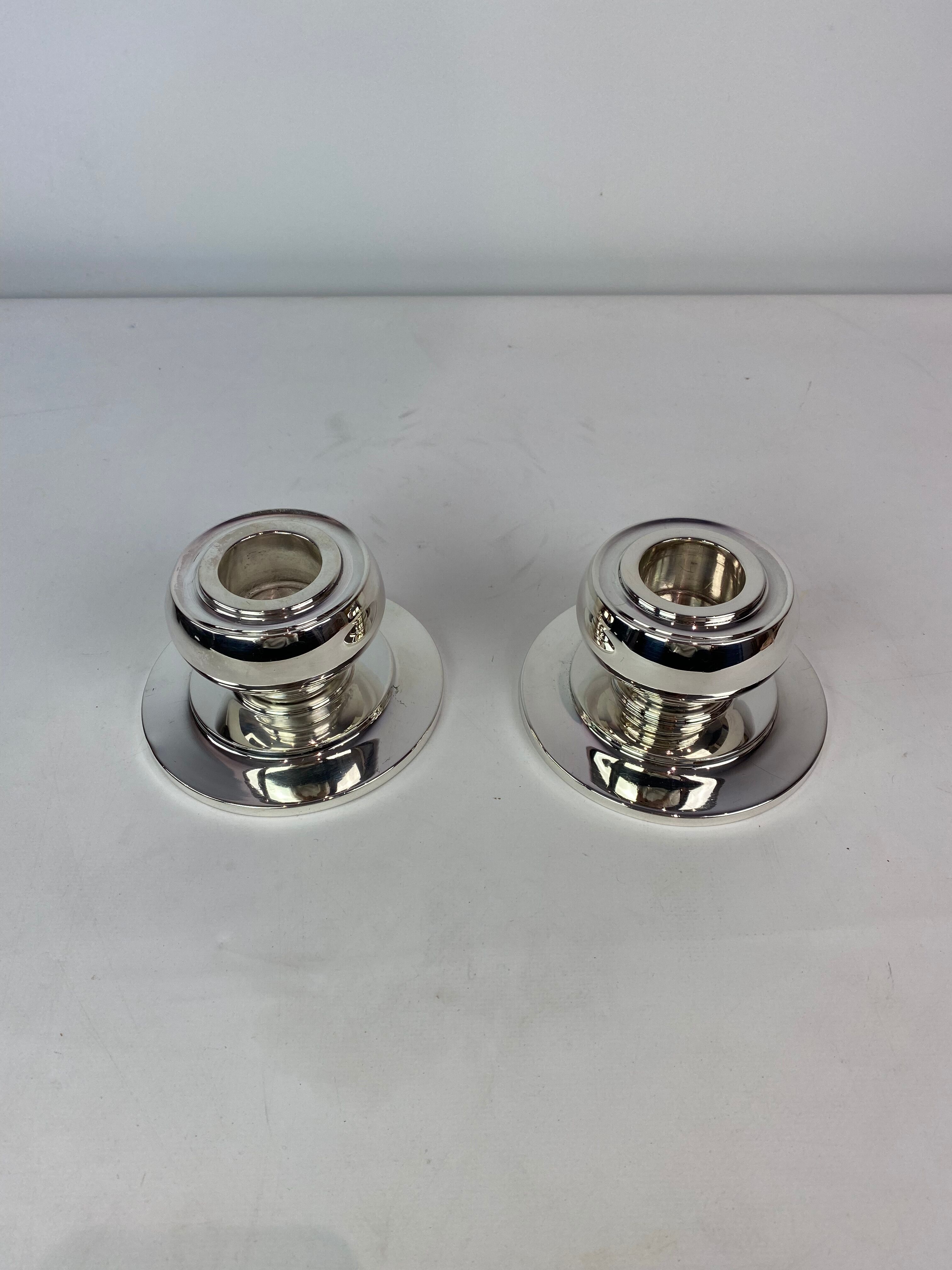 Set of two low candlesticks of 925 sterling and hallmarked silver, 1930s