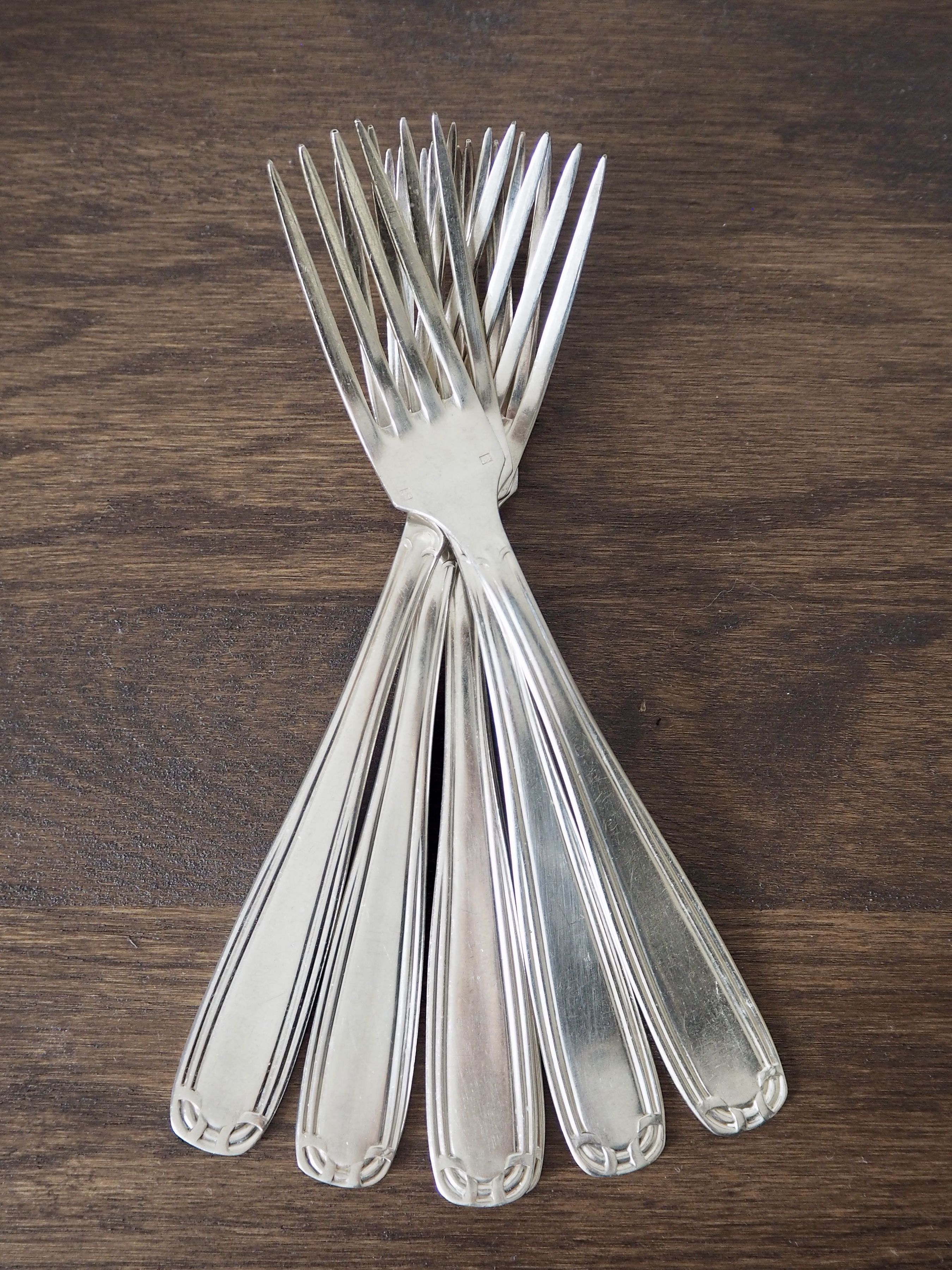 Set of 6 forks and 6 spoons in silver metal with punches