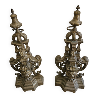Pair of cast iron and silver-plated bronze andirons