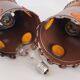 Pair of vintage 1970s brutalist suspensions in copper & orange plastic