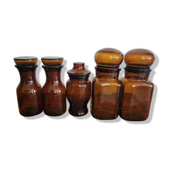 Set of five amber glass jars