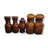 Set of five amber glass jars