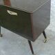 Vintage 1960s rolling and illuminating bar with compass legs.