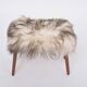 Danish Mid-century Modern stool reupholstered in white and black sheep skin