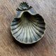 Brass shell clam