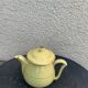 Teapot, yellow earthenware coffee maker and vintage gold edging
