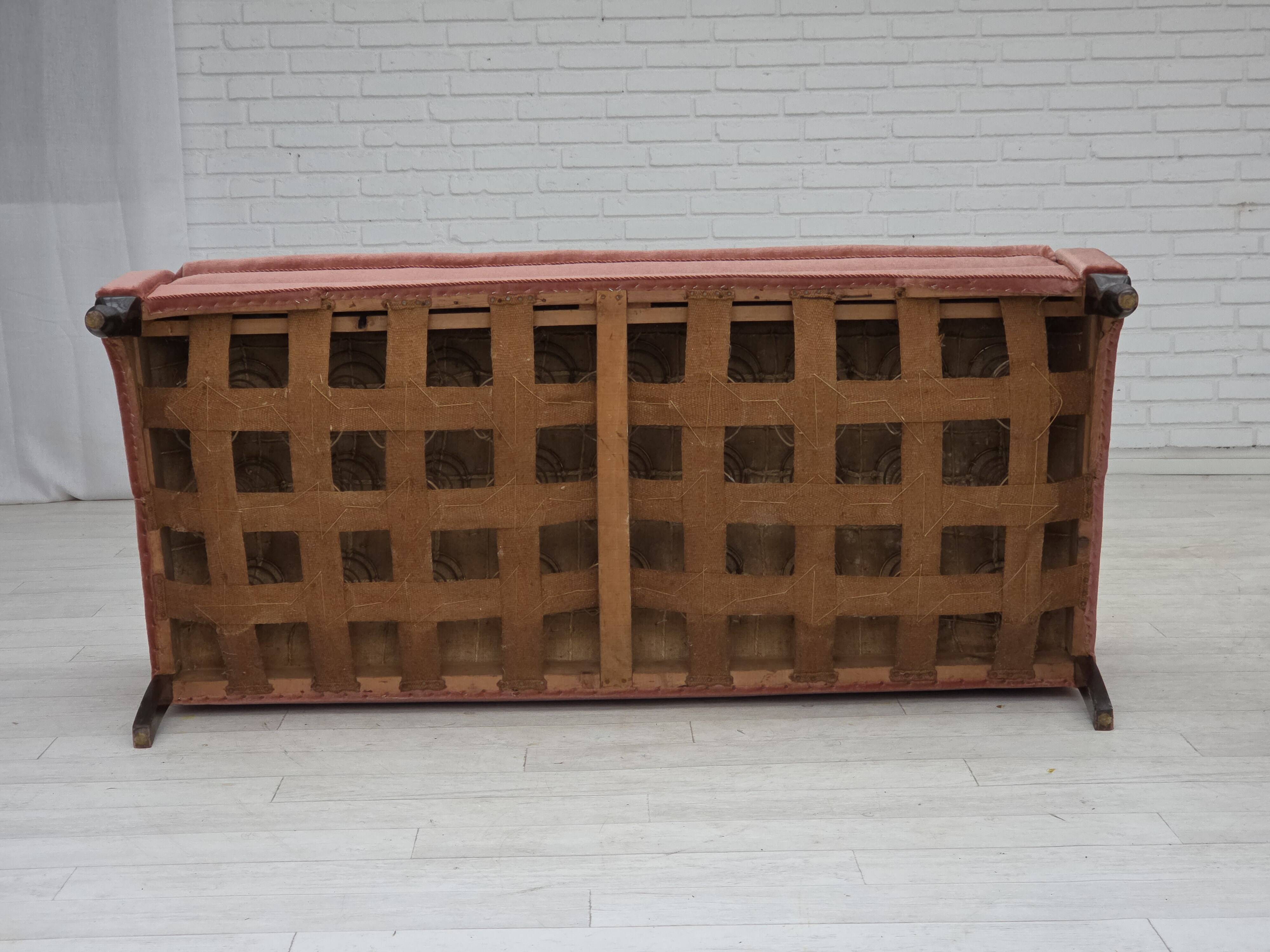 1950s, Danish 2-seater sofa, salmon pink furniture velour, oak wood legs.