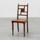 Art Deco oak side chair with carved rosette back and turned front legs, Bel