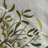 Hand-embroidered tablecloth on rectangular thread canvas
