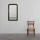 Black laquered and gilted wooden Louis Philippe mirror, France ca. 1850