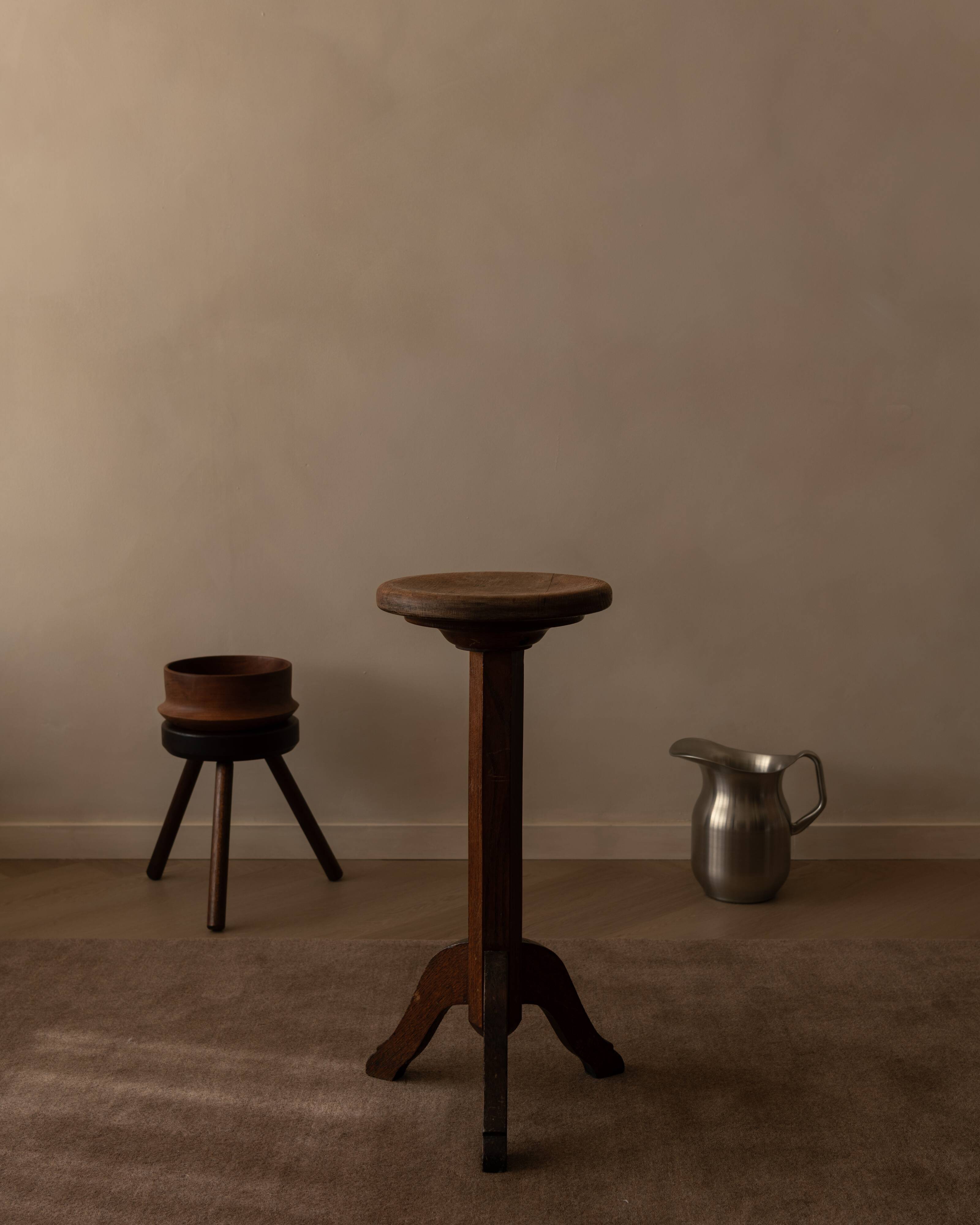 Vintage wooden pedestal plant stand