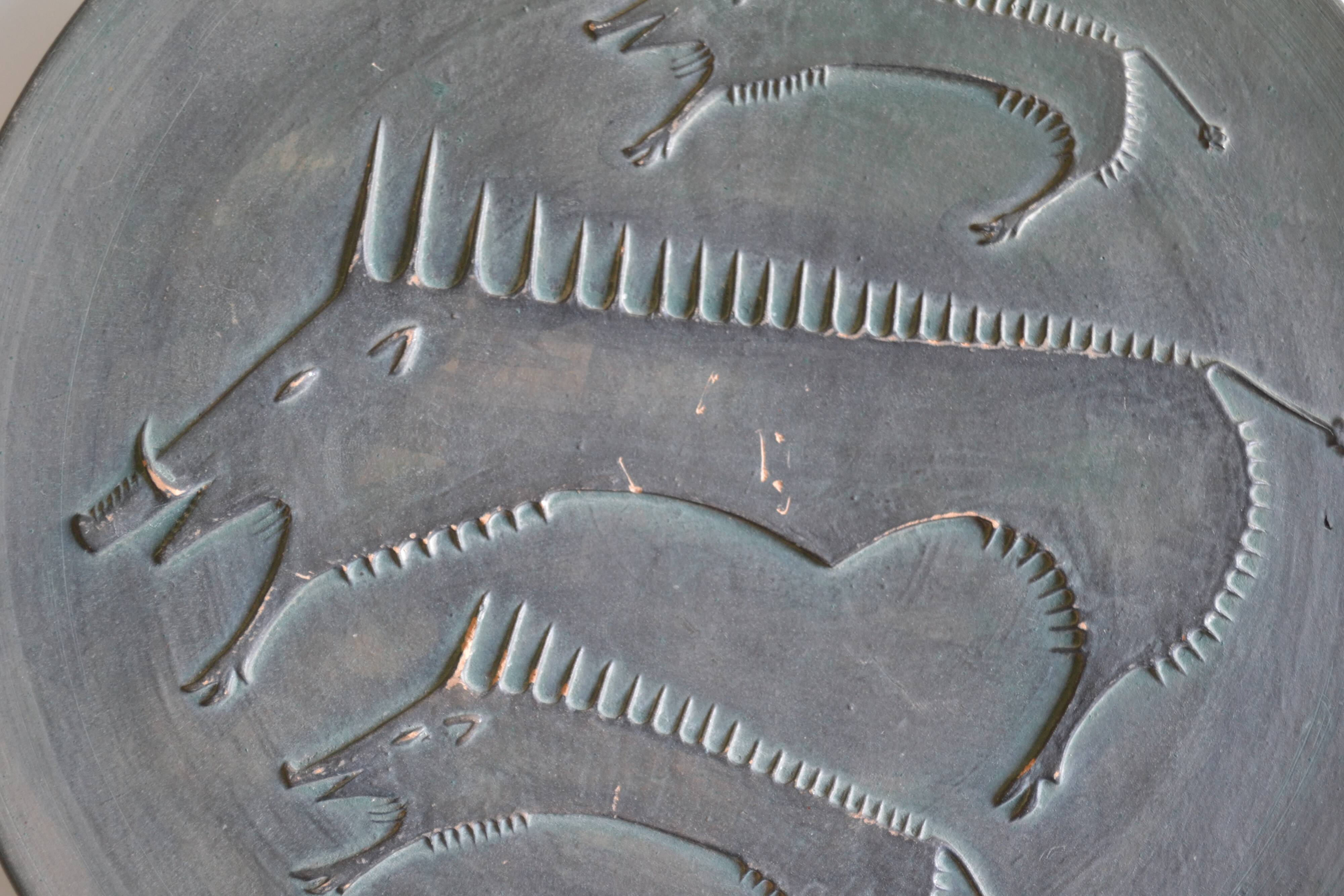 Ceramic wall plate attributed to Wim Mühlendyk