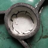 Raku dish with 4 compartments that can be used as an appetizer dish