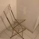 Folding chair in plexiglass and brass
