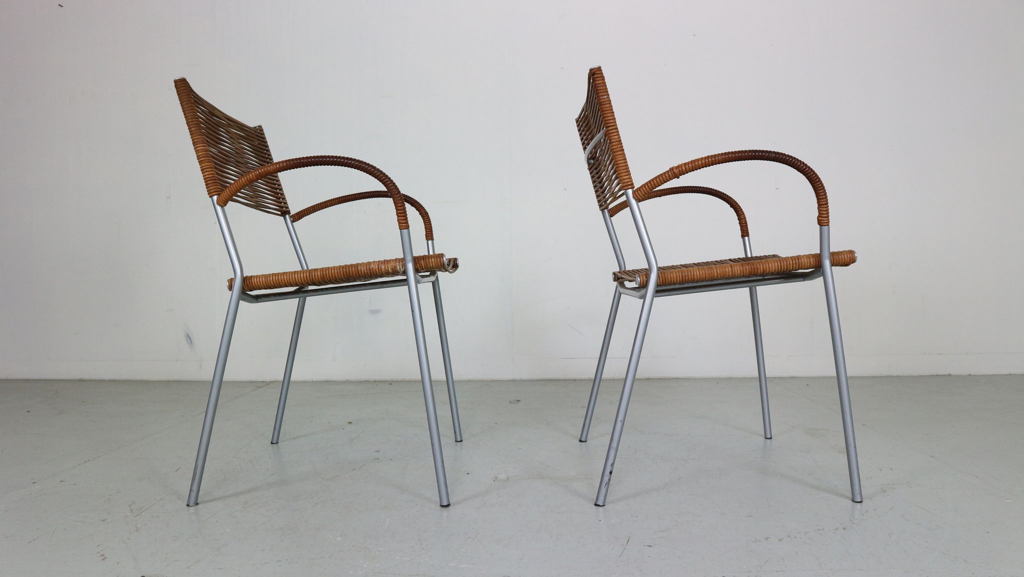 Set of 2 leather Mis B2 RVS armchairs by Tito Agnoli  for Pierantonio Bonacina