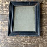 19th century blackened mirror with pitted glass 34cm x 40cm
