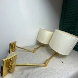 Two wall lights with articulated arm in gold metal Egolux